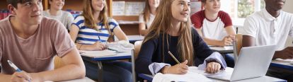 Students sitting at desks in a classroom